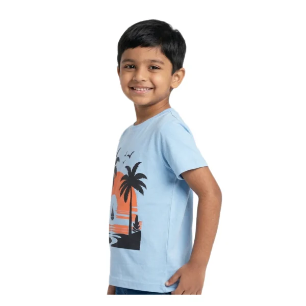 Half-Sleeve Sky Blue Tropical Sunset Graphic T-Shirt featuring “Sunset” (Model Image 4) Sky Blue Tropical Sunset Graphic T-Shirt